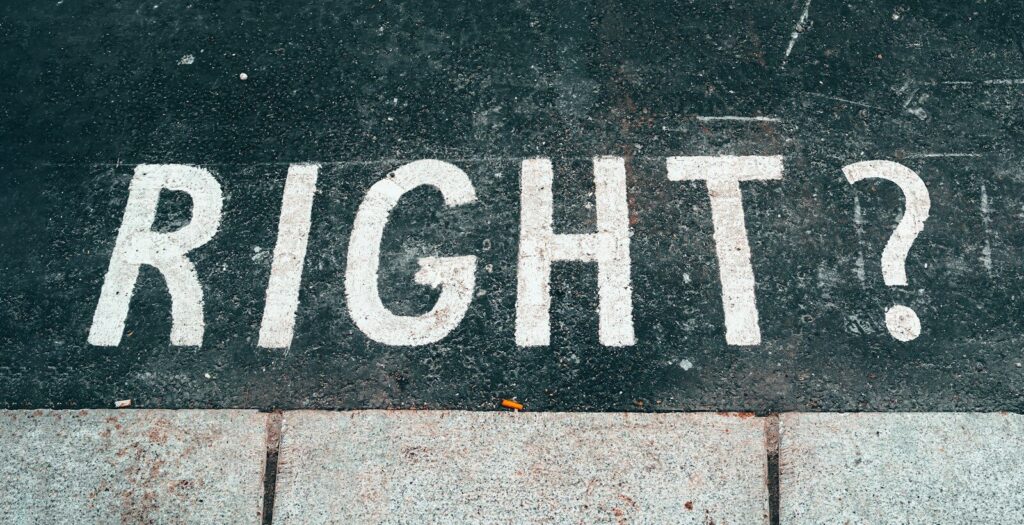 black and white stop road sign